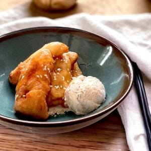 Fried banana with cinnamon ice cream, honey and sesame seeds.