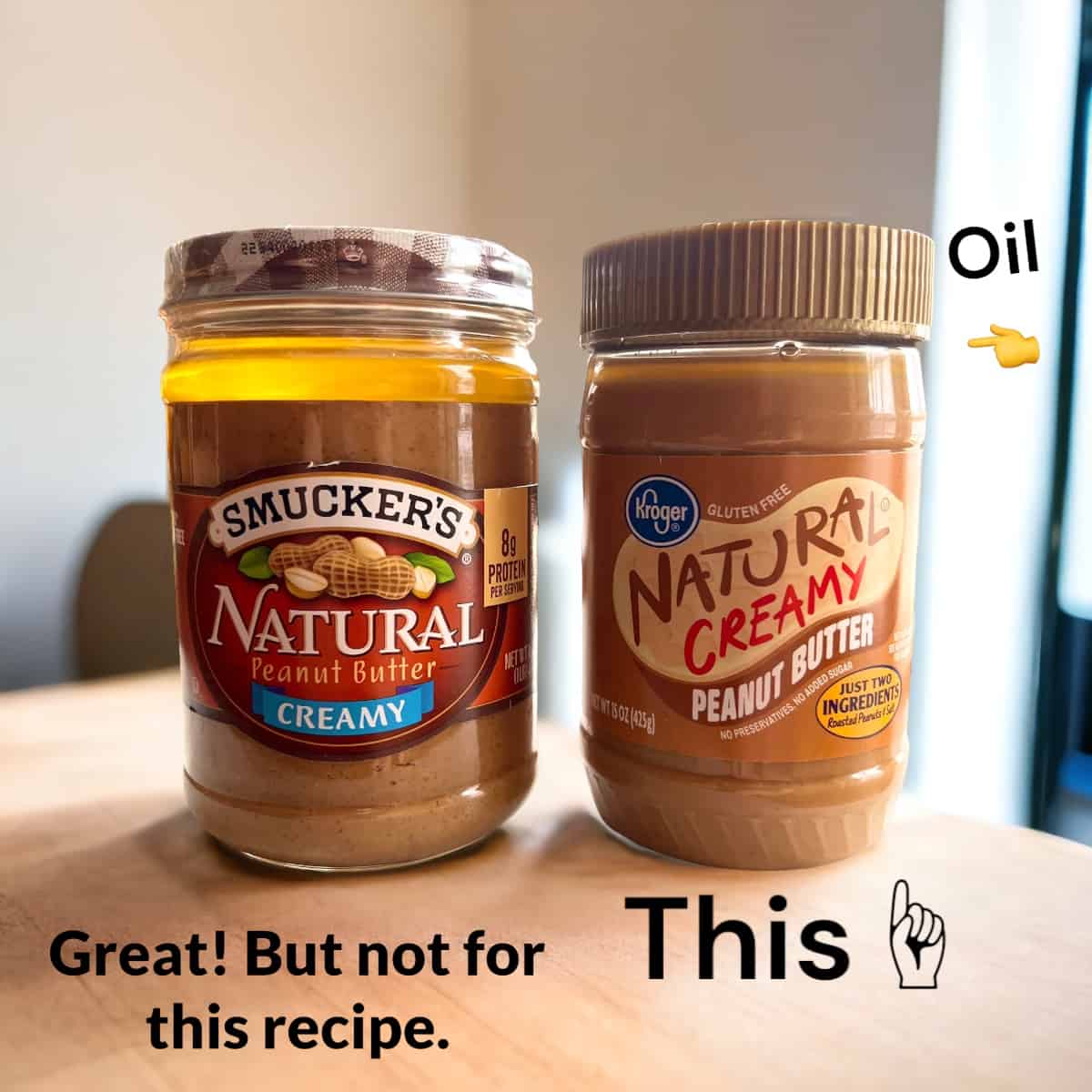 two jars of natural peanut butter with oil separation at the top.