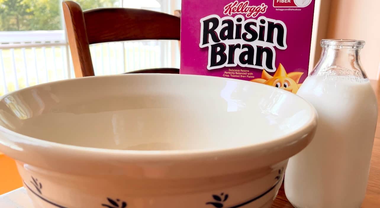 Longaberger Bowl, milk bottle of buttermilk and a box of Raisin Bran Cereal.