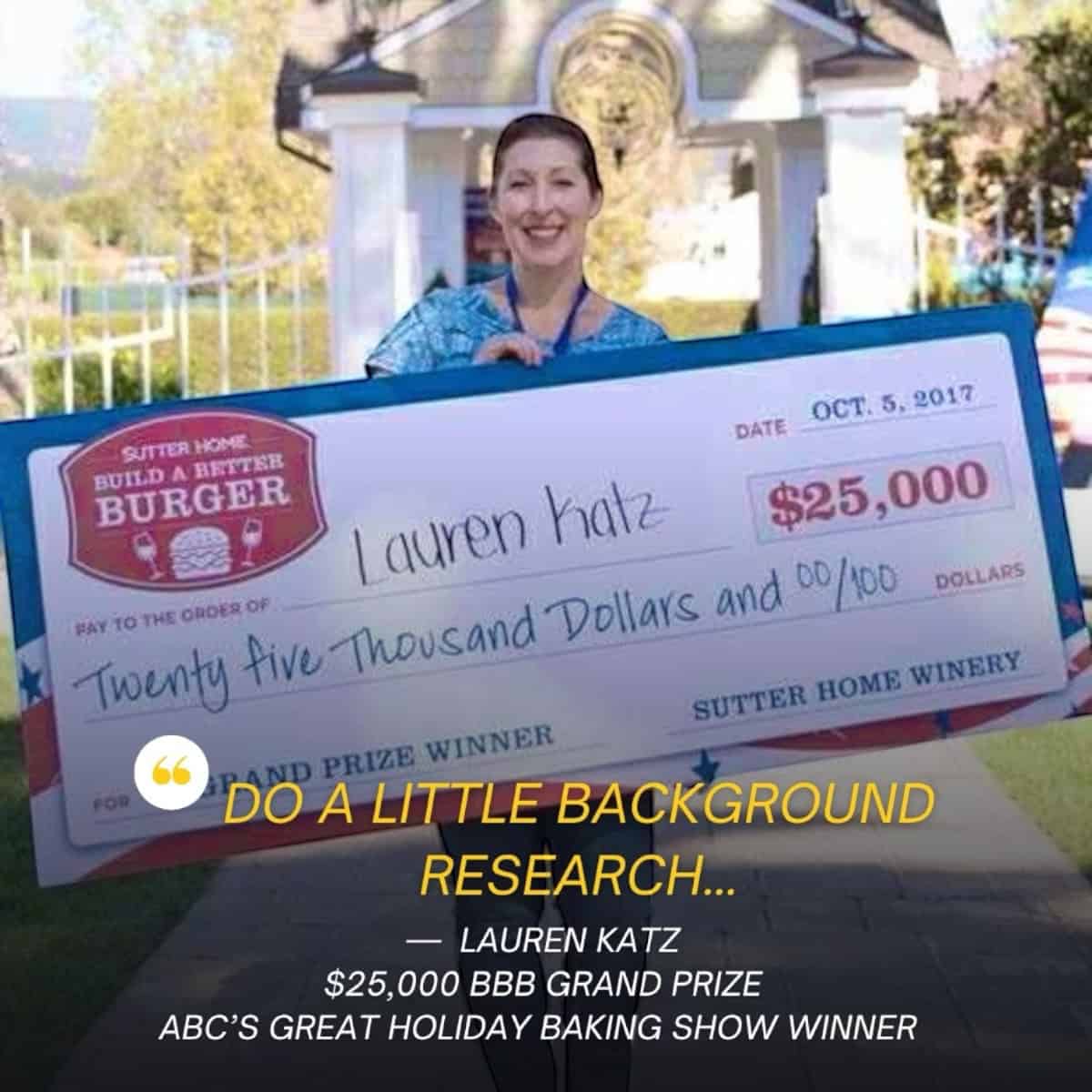 Lauren Katz holding her Prize check.