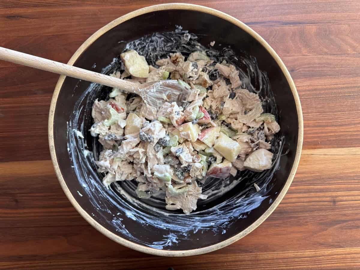 Rotisserie Chicken Salad Mixed together in a bowl.