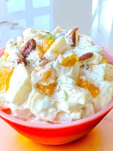 bowl of orange waldorf salad.