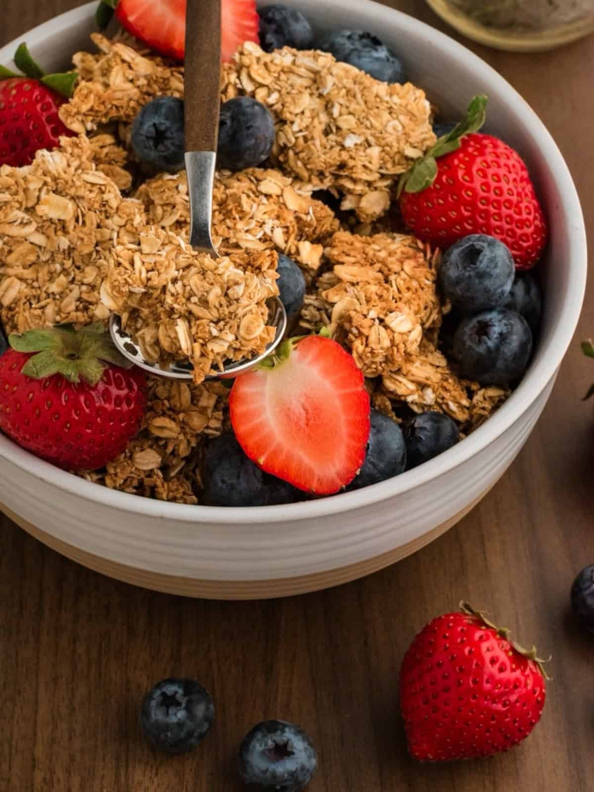bowl of granola with fruit.