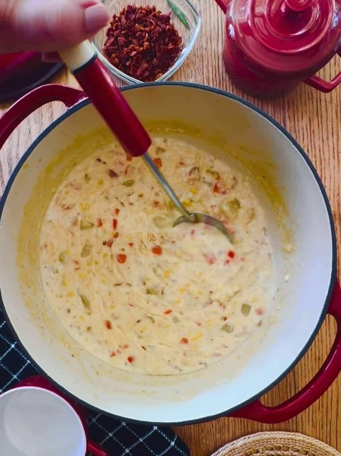 Pot of corn chowder.