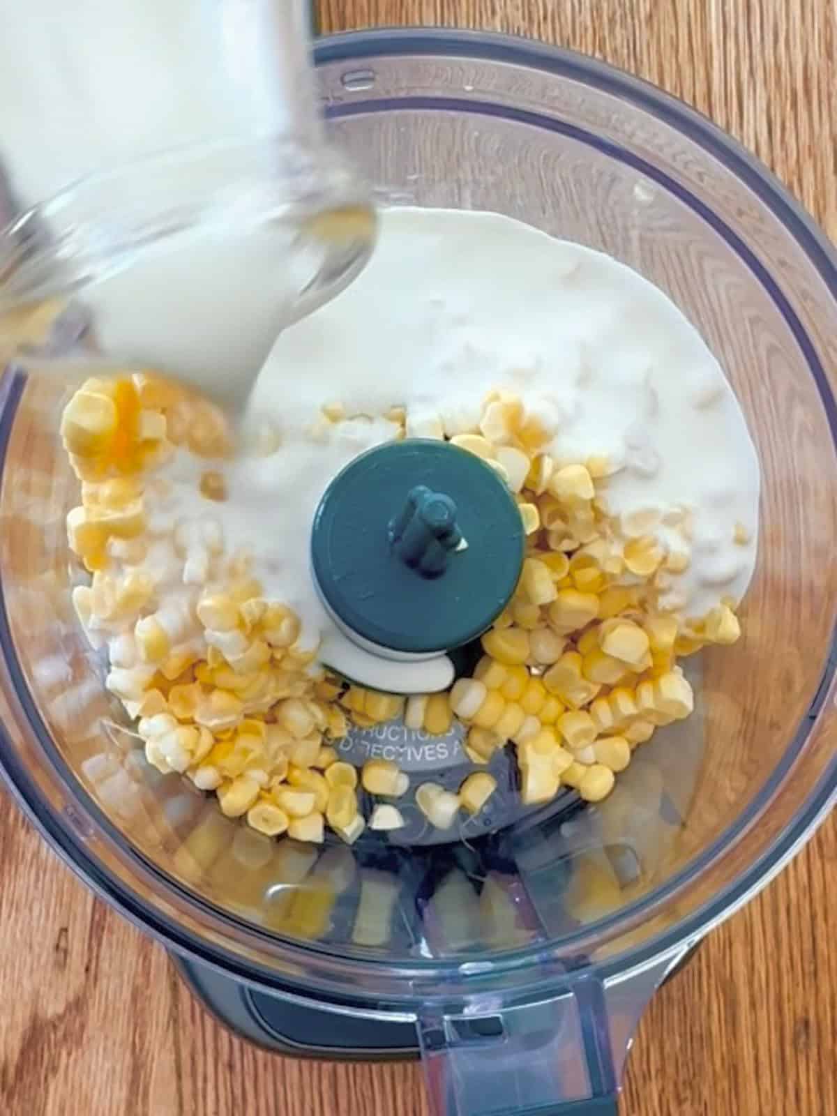 Corn and cream in chopper.
