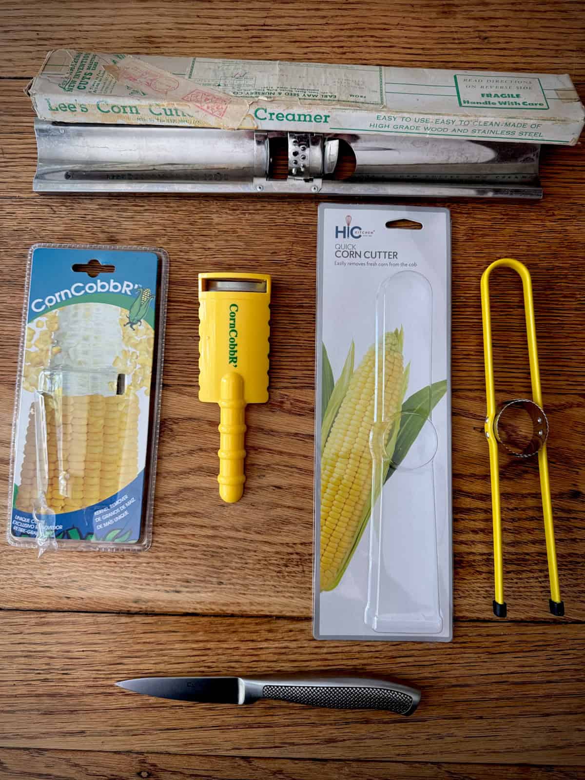 Comparing corn cutting tools.