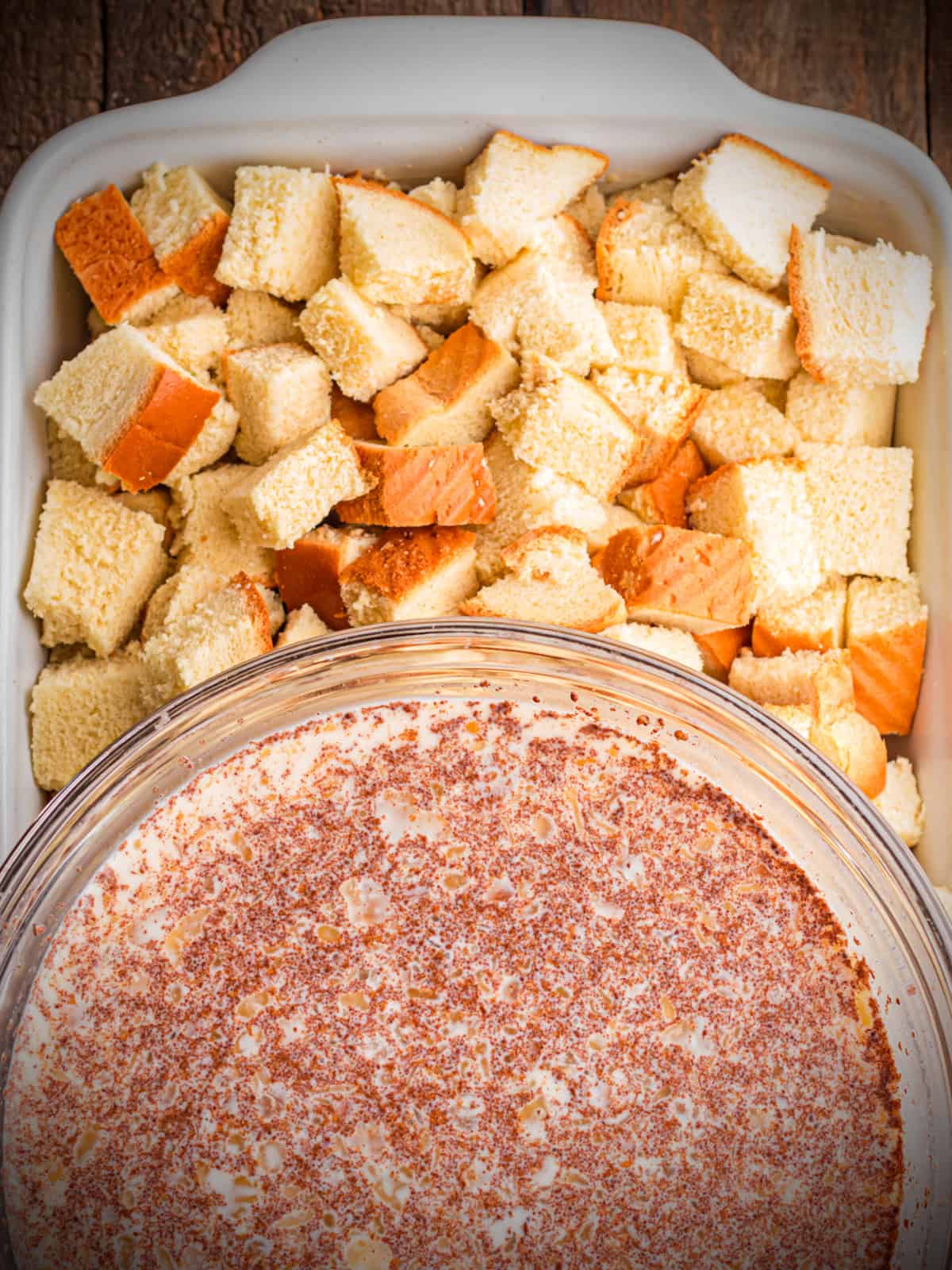 Bowl of milk mixture to soak bread.