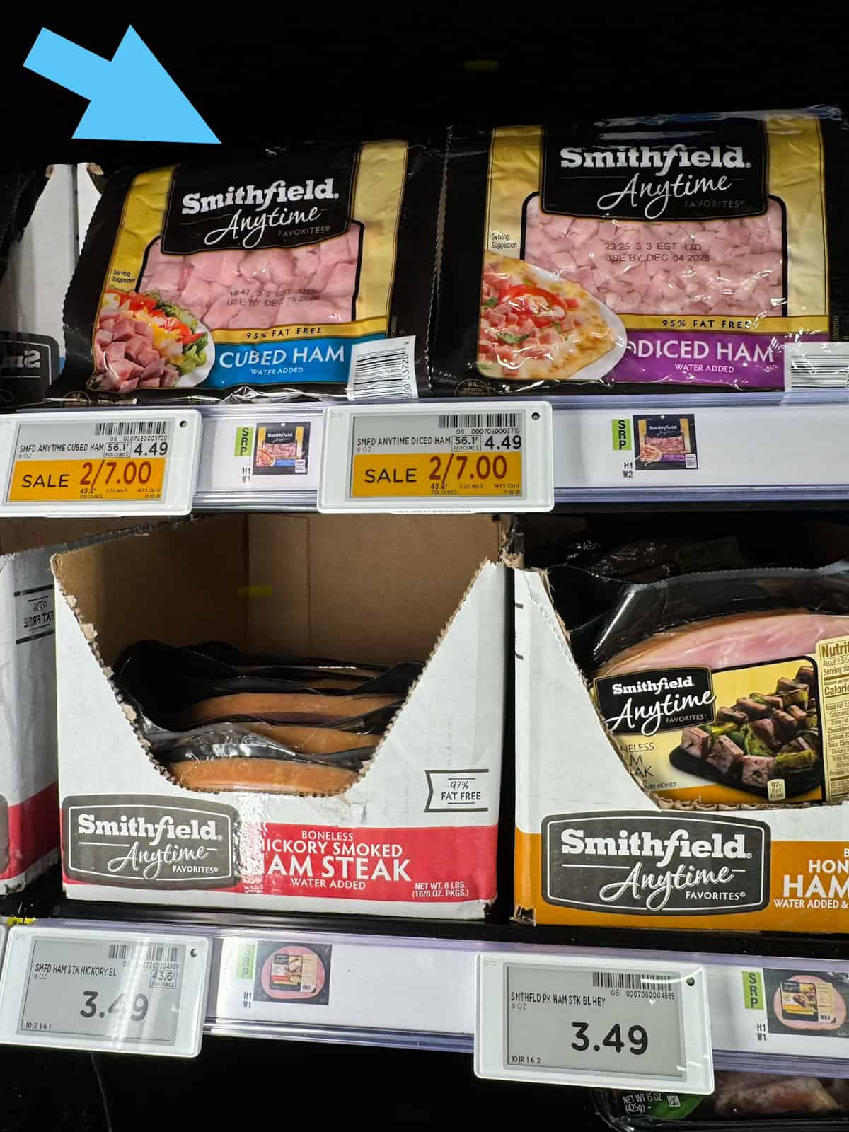 Pkgs. of ham on the shelf.