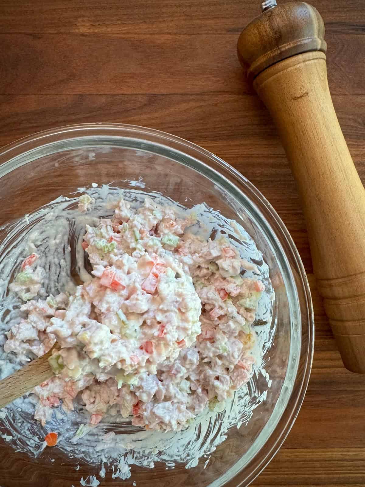 Bowl of stirred ham salad.